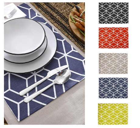 Set of 4 navy blue cotton placemats with printed rib design, ideal for dining protection and decor, machine washable.