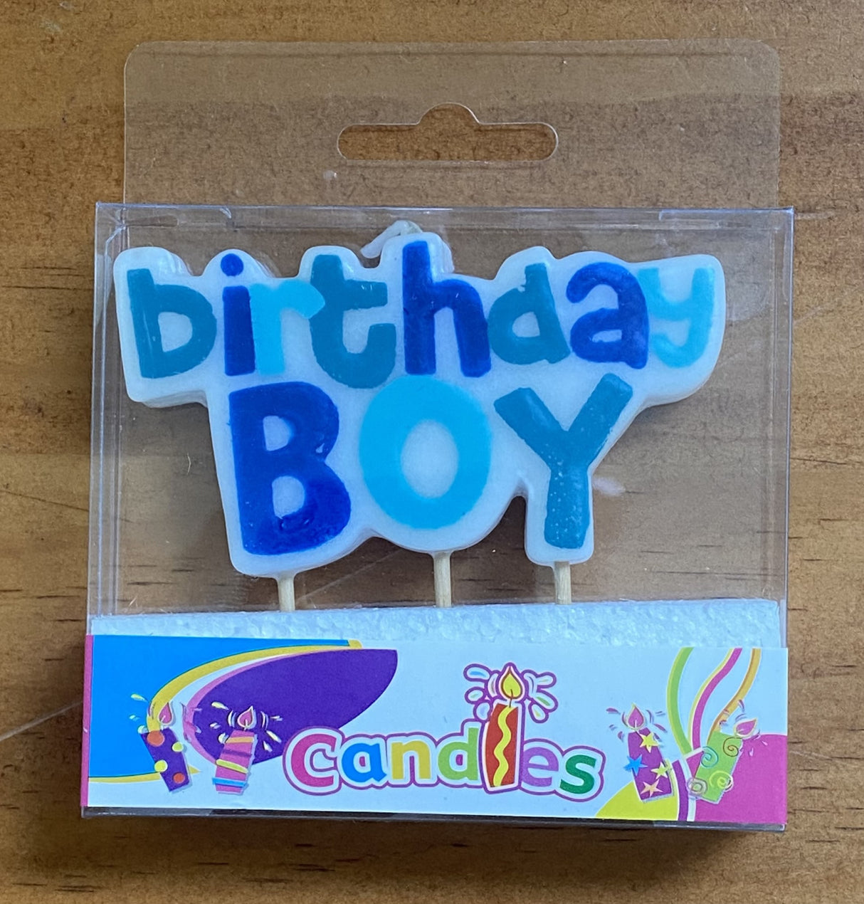 Vibrant Birthday Boy candle, perfect for cake decoration to brighten up your child's special day.