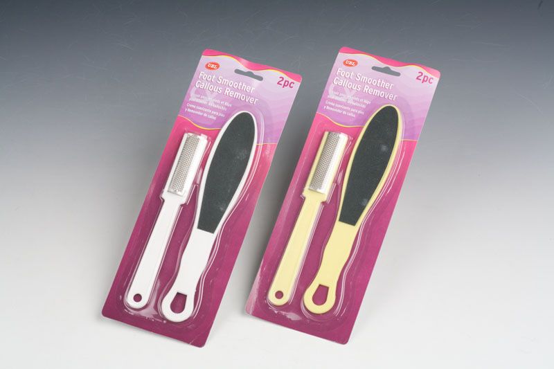"Complete Pedicure Set (Set of 4) with file, buffer, scissors, and cuticle pushers for at-home foot care."