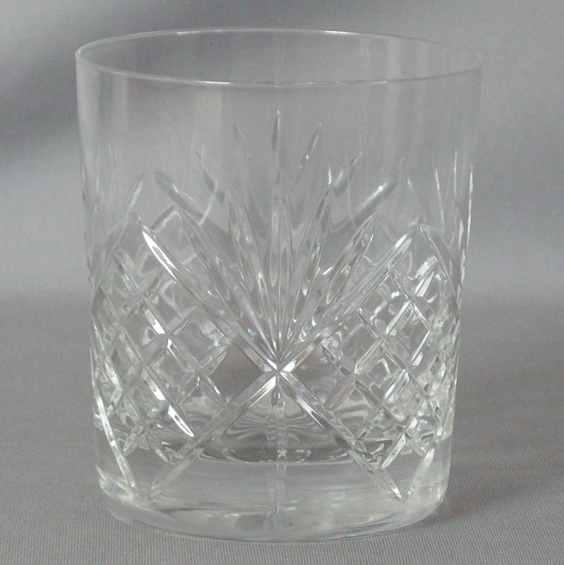 Elegant crystal glass designed for whiskey and cocktails, with stunning clarity and substantial weight for a refined drinking experience.