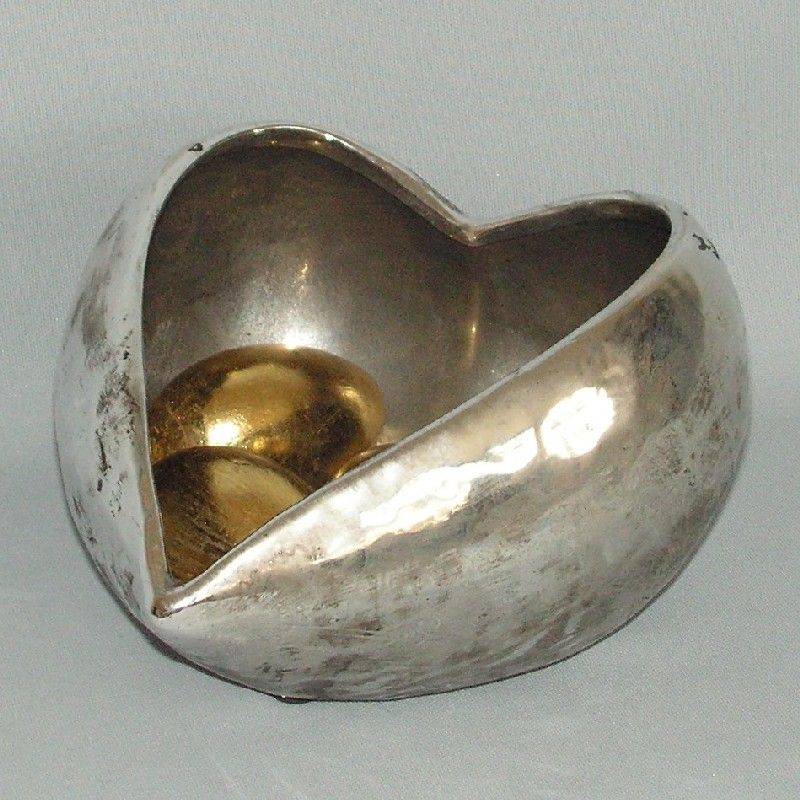 Heart-shaped 9cm bowl for snacks or decor, crafted from durable materials to enhance any table setting.