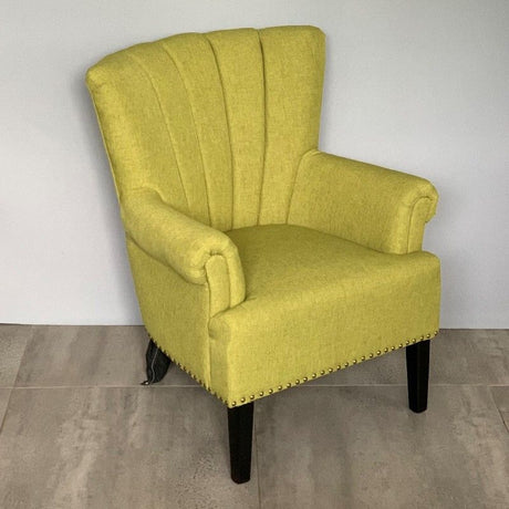 Stylish green armchair with soft upholstery, perfect for modern living spaces and cozy seating at 86cm height.