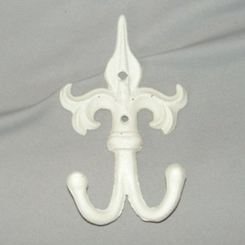 Antique cream cast iron double hook with Fleur De Lie motif, ideal for stylish home organization and decor.