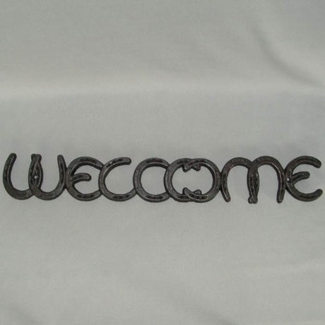 Rustic iron horse shoe welcome sign, 55cm wide, perfect for adding charm to doorways and homes.