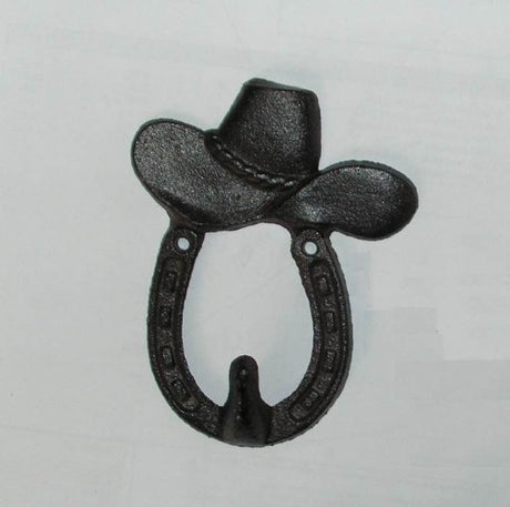 Cowboy hat-shaped key hook made of solid cast iron, perfect for organizing keys with rustic charm.