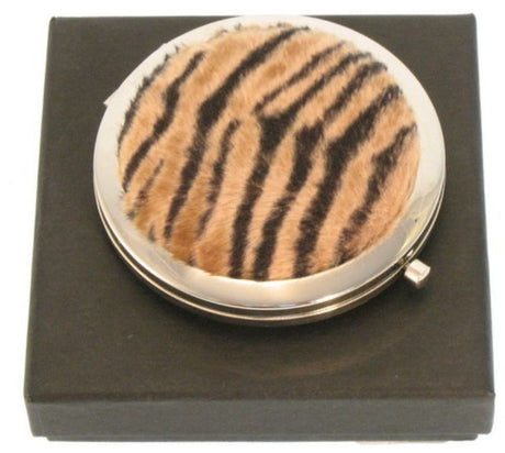 Compact mirrors featuring a striking tiger design, ideal for stylish touch-ups on the go. Perfect travel accessory for women.