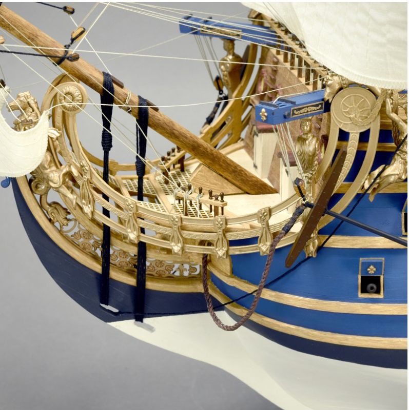 Detailed 1/72 scale model of King Louis XIV's Soleil Royal warship, featuring exquisite wooden craftsmanship and intricate sails.