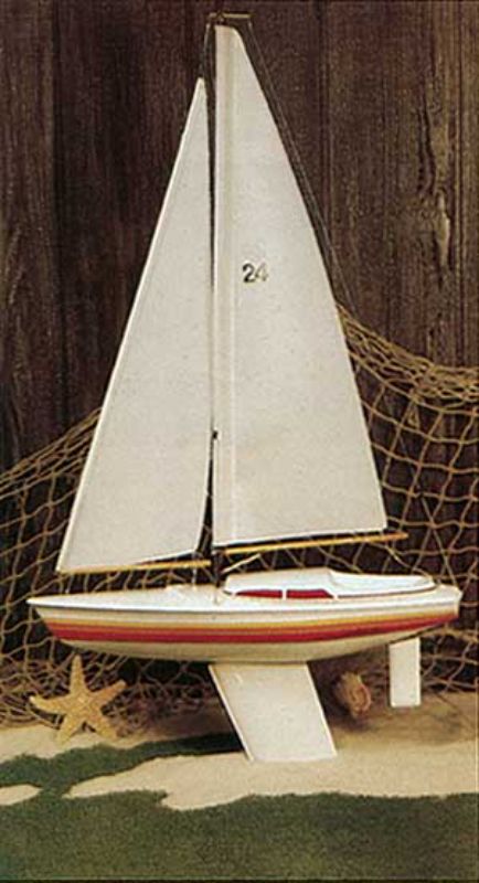 Detailed 24" wooden Huson sailboat model with balsa hull, dacron sails, and carbon fiber mast, perfect for RC sailing enthusiasts.