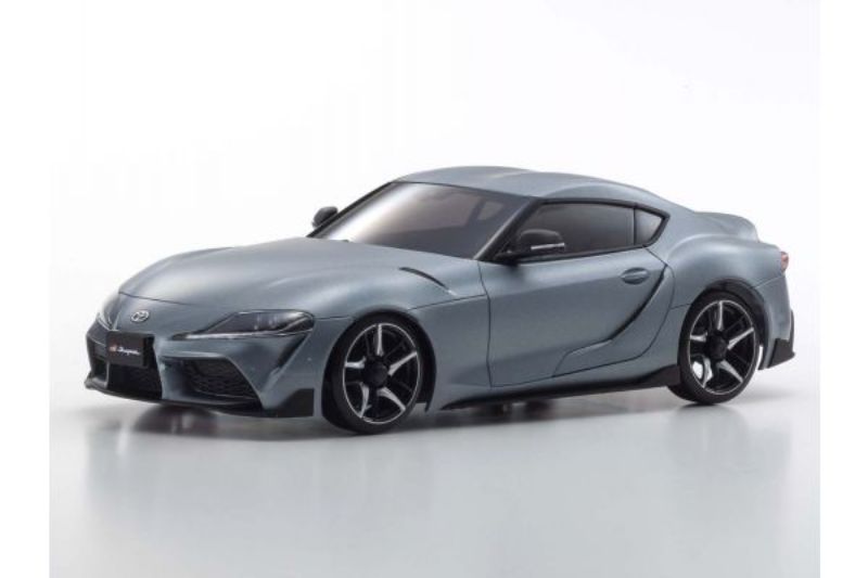 Kyosho AWD GR Supra body set in grey metallic, featuring detailed craftsmanship and a glossy finish for collectors and racers.