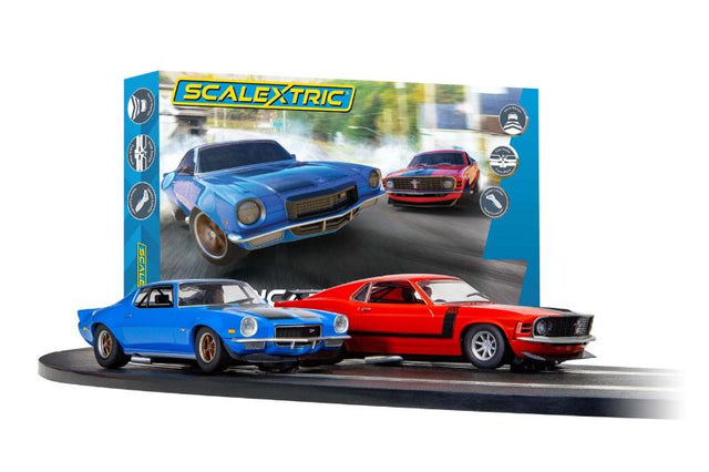 Scalextric American Street Race Duel set featuring Chevrolet Camaro and Ford Mustang on a thrilling 532 cm track with stunts.