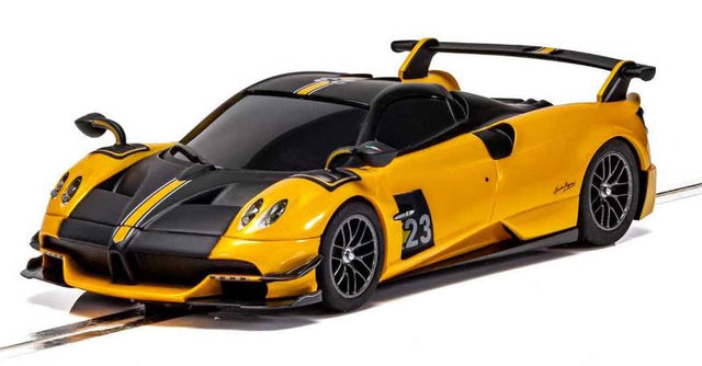 Scalextric Pagani Huayra Roadster BC in yellow, showcasing sleek design and powerful engine for thrilling slot car racing.