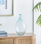 Softly teal bubble glass bottle with rounded shape, featuring tiny air bubbles, perfect for floral displays or as a centerpiece.