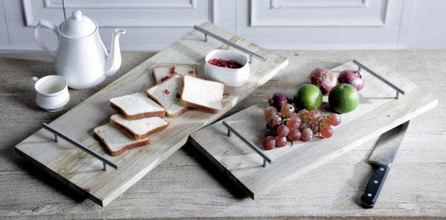 Set of 2 wooden platters, 58cm each, eco-friendly and stylish, perfect for serving food and enhancing dining experiences.