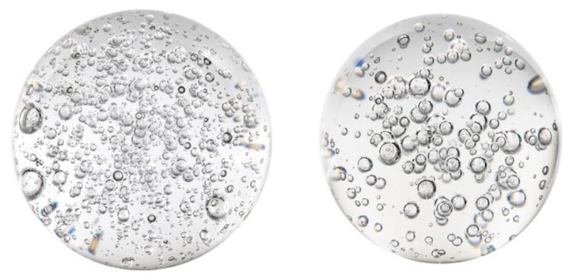 Set of 2 elegant 10cm glass Bubble Spheres with unique bubbled interiors, perfect for enhancing home decor and light refraction.