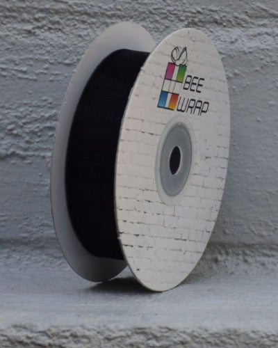 Black cut edge organza ribbon, 25mm wide, 50m long, perfect for elegant gift wrapping and creative projects. Clearance price!