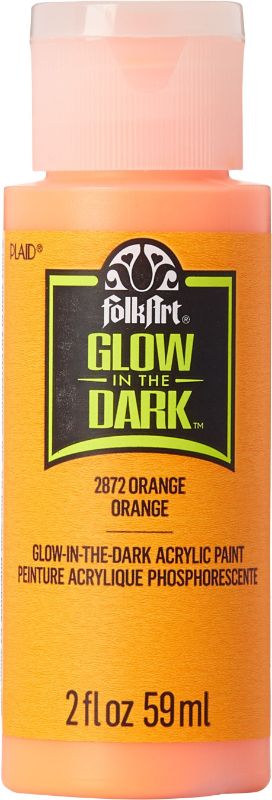 Bright orange Folk Art glow-in-the-dark acrylic paint in a 2oz bottle, ideal for crafts and DIY projects with excellent coverage.