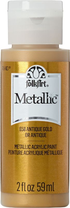 Folk Art Antique Gold Acrylic Metallic Paint in a 2oz bottle, perfect for adding shimmer to various DIY crafting projects.