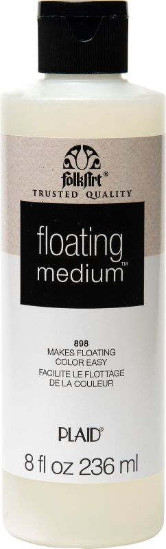 Folk Art Floating Medium 8oz, ideal for creating smooth brush strokes and watercolor effects on wood and canvas.