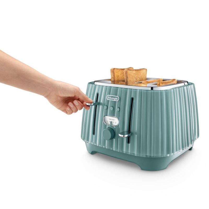 Elegant green 4-slice toaster with Venetian glass-inspired design, variable browning control, and removable crumb tray.