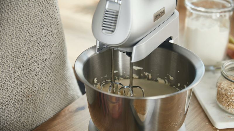 Kenwood Chefette stand and hand mixer in silver with 650W motor, variable speeds, and included stainless steel bowl and accessories.