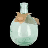 Clear glass terrarium bottle with cork top, perfect for creating self-sustaining ecosystems in a home or office setting.