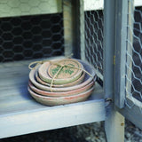 Handcrafted terracotta saucers, 14x14x2cm, in a rustic Tuscan style to enhance plant care and decor. Set of 3.