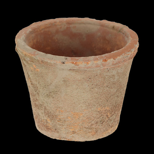 Rustic Tuscan-inspired terracotta pots in wooden crate, perfect for elegant indoor/outdoor gardening.