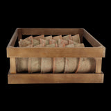 Rustic Tuscan terracotta pots in a wooden crate, ideal for stylish indoor or outdoor gardening display.