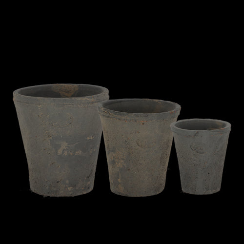 Set of 6 handcrafted terracotta pots with a Tuscan design, featuring drainage holes for healthy plant growth.