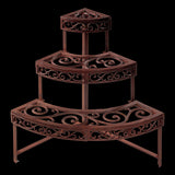 Elegant half-round cast iron etagere with three shelves, perfect for showcasing decor and plants in any corner.