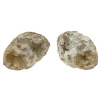 Pair of split Geode Quartz Crystals showcasing sparkling inner quartz, ideal for home decor and promoting positive energy.