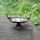 Bird bath with raised foot and two decorative birds, ideal for attracting and feeding wild birds in your garden.