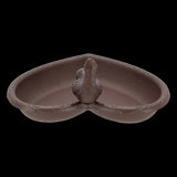 Set of 2 heart-shaped cast iron bird feeders and baths, perfect for attracting birds to your garden with food or water.
