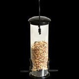 Sleek black bird feeder (22cm) designed to keep seeds dry, featuring a perch for easy access by garden birds.