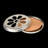 Citronella coils and zinc burner measuring 14x14x3cm for natural insect repellent in outdoor spaces, includes 10 coils.