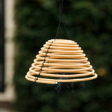 Hanging citronella coil (16x11cm) designed to repel mosquitoes with a soothing aroma, providing 22 hours of outdoor protection.