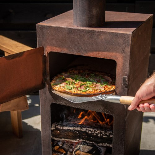 Stainless steel pizza peel with hanging loop, perfect for transferring pizzas and enhancing your baking experience.