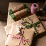 Assorted 36-piece raffia set in natural, green, and brown, ideal for crafts, gardening, and eco-friendly packaging.