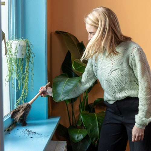 Lightweight feather duster with real ostrich feathers and a beech wood handle for gentle, effective dusting of delicate items.