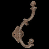 Set of 8 assorted cast iron coat hooks featuring unique designs, ideal for stylishly organizing any space.