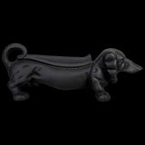 Black cast iron boot scraper shaped like a dachshund, 32cm long, perfect for keeping floors clean and adding whimsical decor.