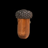 Acorn-shaped birdhouse made from FSC certified wood, providing a safe nesting site and winter refuge for birds.