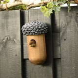 Charming acorn-shaped birdhouse made from FSC certified wood, perfect for nesting and winter refuge for local birds.