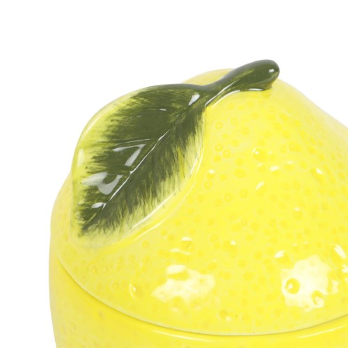 Bright yellow lemon-themed oil burner, 11 x 11 x 14.5 cm, perfect for diffusing scents and enhancing home decor.