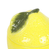 Bright yellow lemon-themed oil burner, 11 x 11 x 14.5 cm, perfect for diffusing scents and enhancing home decor.