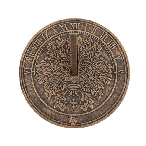 Green Man terracotta sundial by Lisa Parker, featuring a rustic finish and intricate design, perfect for garden decor.