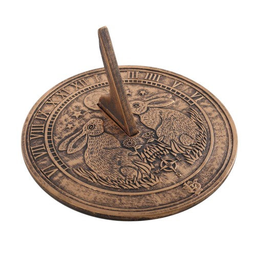 Moon Gazing Hare terracotta sundial featuring a rustic finish, ideal for outdoor decor and telling time in gardens.
