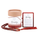 Elegant mala necklace with 108 rosewood beads and Red Jasper stones, promoting mindfulness and spiritual grounding.