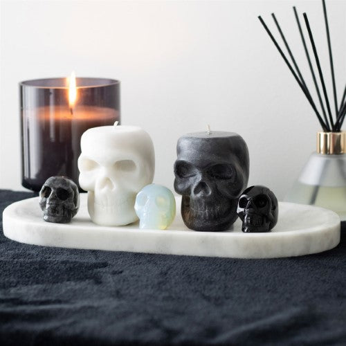 Black Labradorite Crystal Skull in a sleek design, offering grounding energy and style; perfect for meditation and desk decor.