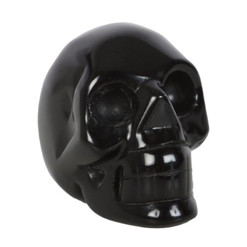 Handcrafted Black Obsidian Crystal Skull, 4x5x2 cm, offering purification and protection, perfect for decor and metaphysical healing.